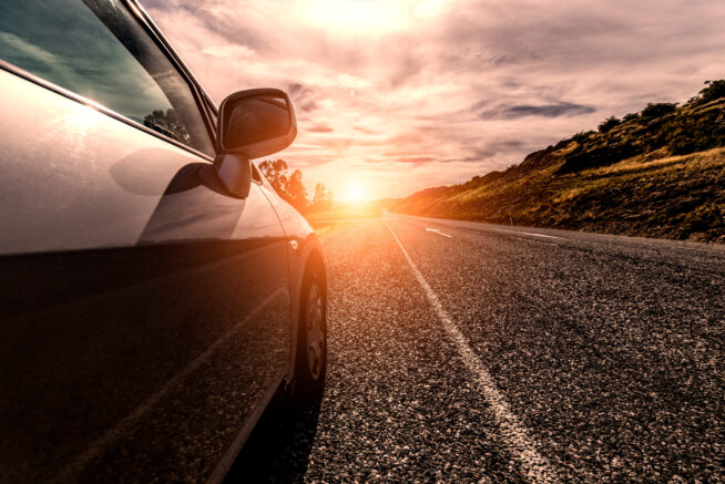 Car ride on road in sunny weather